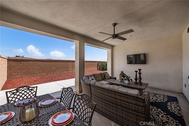 16671 Zest Ct, Riverside, CA 92503 - fenced backyard with ceiling fan, a patio, and an outdoor hangout area