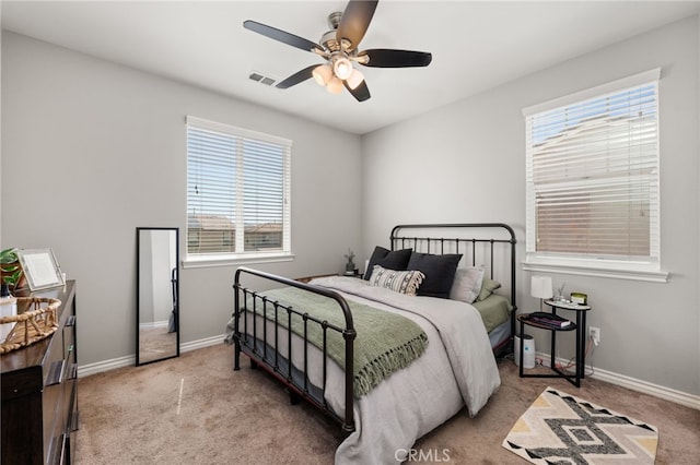 16671 Zest Ct, Riverside, CA 92503 - bedroom featuring carpet floors, multiple windows, and ceiling fan