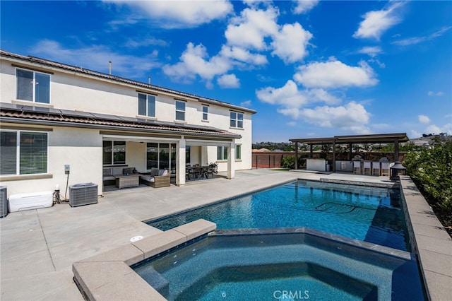 16671 Zest Ct, Riverside, CA 92503 - view of pool with outdoor lounge area, a patio, and a pool with connected hot tub
