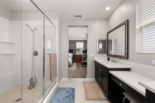 16671 Zest Ct, Riverside, CA 92503 - bathroom with connected bathroom, vanity, a shower stall, tile patterned floors, and recessed lighting