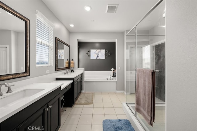 16671 Zest Ct, Riverside, CA 92503 - full bath featuring two vanities, a shower stall, a bath, tile patterned floors, and recessed lighting