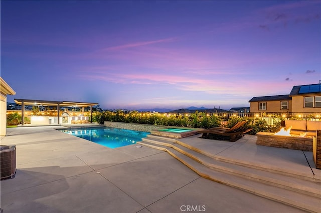 16671 Zest Ct, Riverside, CA 92503 - view of swimming pool featuring an outdoor fire pit, a patio area, and a pool with connected hot tub