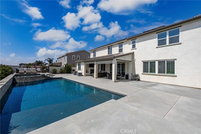 16671 Zest Ct, Riverside, CA 92503 - view of pool featuring outdoor lounge area, a patio, and a pool with connected hot tub
