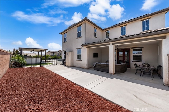 16671 Zest Ct, Riverside, CA 92503 - back of property with stucco siding, an outdoor living space, and a patio