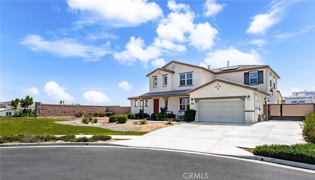 16671 Zest Ct, Riverside, CA 92503 - view of front facade featuring roof mounted solar panels, stucco siding, driveway, and a garage