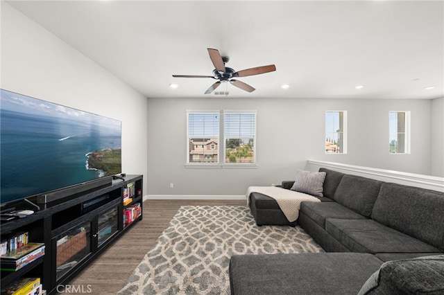 16671 Zest Ct, Riverside, CA 92503 - living area with wood finished floors, plenty of natural light, a ceiling fan, and recessed lighting