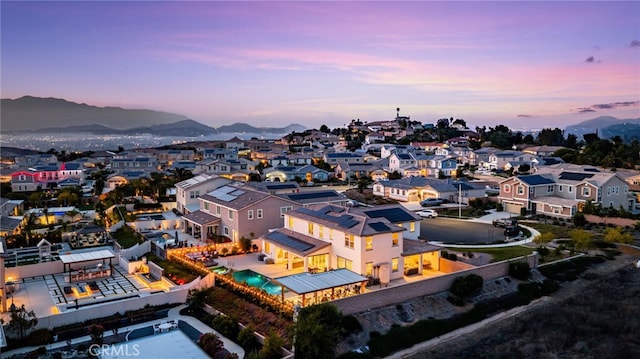 16671 Zest Ct, Riverside, CA 92503 - aerial view at dusk of a residential view and a mountain view