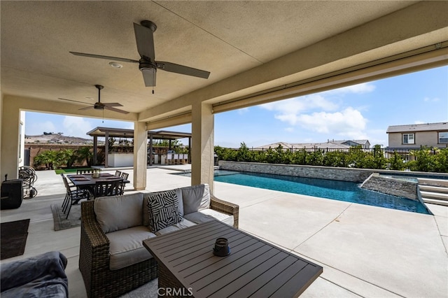 16671 Zest Ct, Riverside, CA 92503 - view of patio with outdoor dining area, a pool with connected hot tub, ceiling fan, and outdoor lounge area