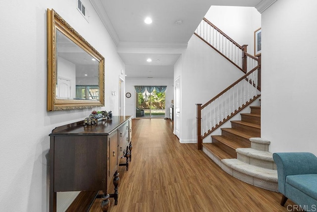 1837 Ashley Ave, Chula Vista, CA 91913 - foyer featuring wood finished floors, stairs, and crown molding