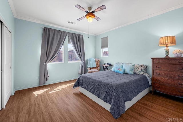 1837 Ashley Ave, Chula Vista, CA 91913 - bedroom with wood finished floors, crown molding, ceiling fan, and a closet
