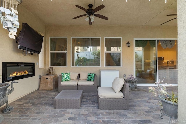 1837 Ashley Ave, Chula Vista, CA 91913 - view of patio / terrace with ceiling fan and an outdoor living space with a fireplace