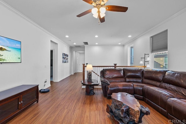 1837 Ashley Ave, Chula Vista, CA 91913 - living room featuring wood finished floors, a ceiling fan, recessed lighting, and ornamental molding