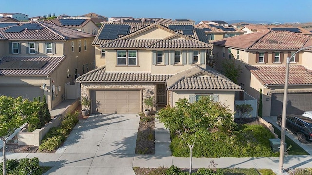1837 Ashley Ave, Chula Vista, CA 91913 - view of front of property with a residential view, concrete driveway, stucco siding, and an attached garage