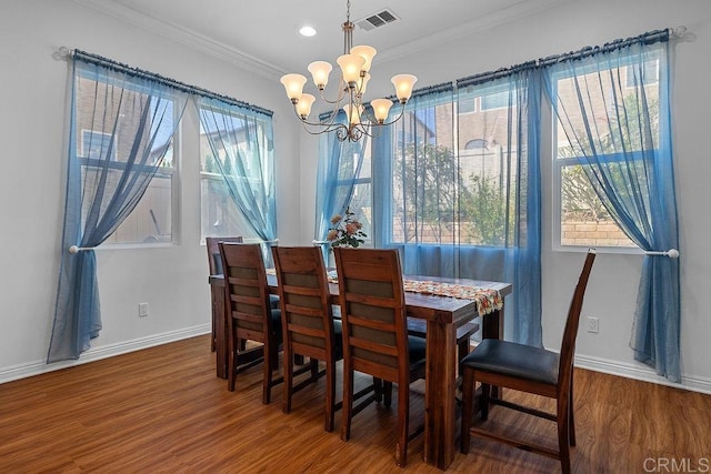 1837 Ashley Ave, Chula Vista, CA 91913 - dining area with wood finished floors, a chandelier, ornamental molding, and recessed lighting