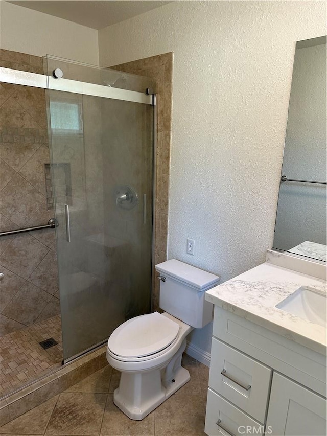 8567 Jasper St, Rancho Cucamonga, CA 91730 - full bath with vanity, a shower stall, a textured wall, and tile patterned floors