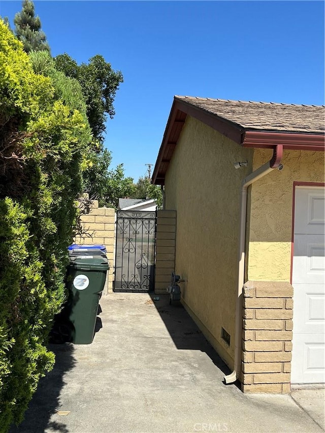 8567 Jasper St, Rancho Cucamonga, CA 91730 - view of side of home with stucco siding and crawl space