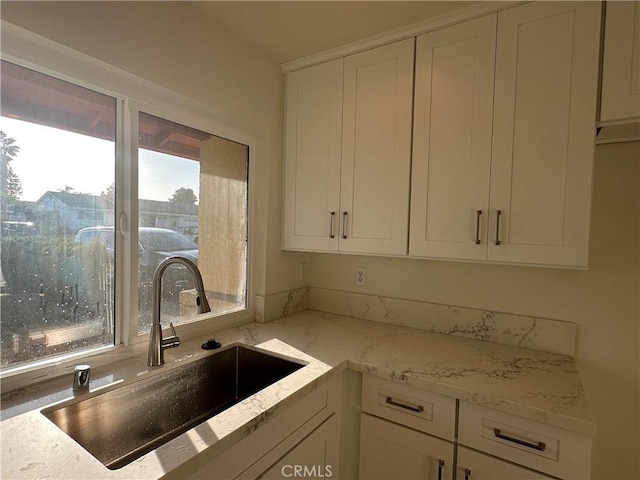 8567 Jasper St, Rancho Cucamonga, CA 91730 - kitchen with white cabinetry and light stone countertops