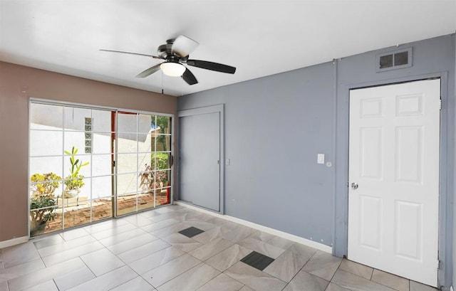 2045 W Clover Ave, Anaheim, CA 92801 - unfurnished room featuring a ceiling fan and light tile patterned floors