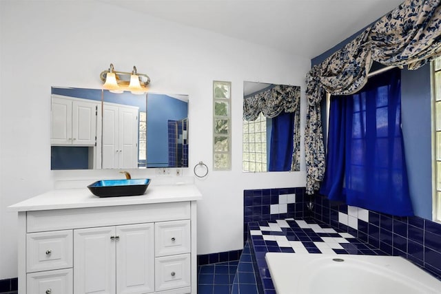 2045 W Clover Ave, Anaheim, CA 92801 - bathroom with vanity, a tub, and tile patterned flooring