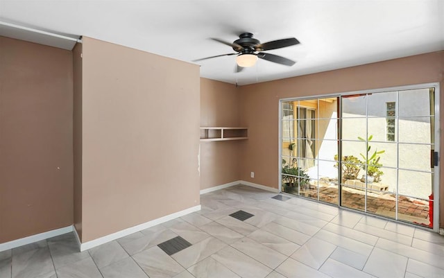 2045 W Clover Ave, Anaheim, CA 92801 - spare room with ceiling fan and baseboards