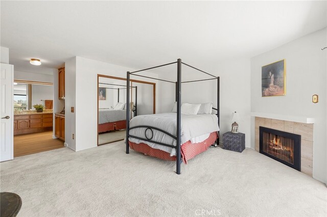 22074 Cedardale Dr, Diamond Bar, CA 91765 - bedroom featuring light carpet, a fireplace, and ensuite bathroom