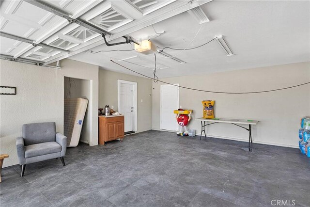 10325 Sheep Creek Rd, Phelan, CA 92371 - garage with a garage door opener