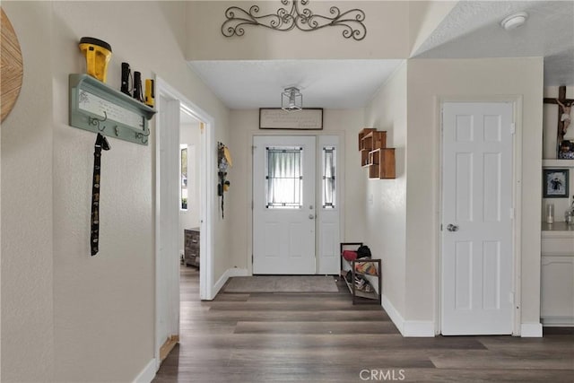 10325 Sheep Creek Rd, Phelan, CA 92371 - foyer entrance featuring wood finished floors and baseboards