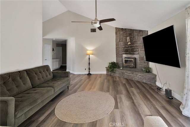 10325 Sheep Creek Rd, Phelan, CA 92371 - living room with a ceiling fan, wood finished floors, a stone fireplace, and high vaulted ceiling
