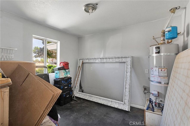 10325 Sheep Creek Rd, Phelan, CA 92371 - miscellaneous room with water heater and a textured ceiling