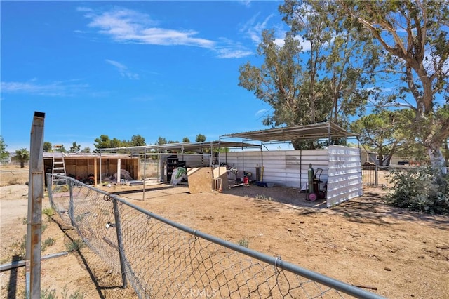 10325 Sheep Creek Rd, Phelan, CA 92371 - view of outdoor structure with a detached carport and an exterior structure