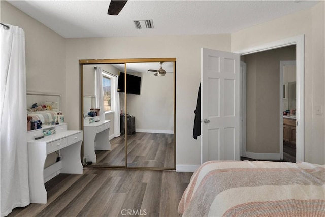 10325 Sheep Creek Rd, Phelan, CA 92371 - bedroom featuring wood finished floors, a closet, and a ceiling fan