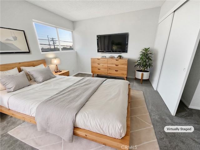 1815 W 145th St Unit 9, Gardena, CA 90249 - bedroom with a closet and a textured ceiling