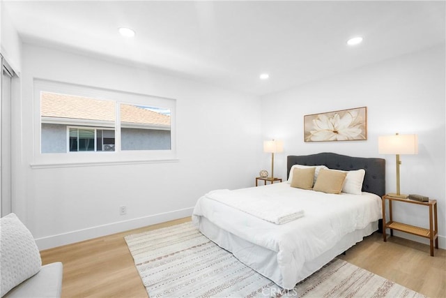 9554 Bickley Dr Unit 8, Huntington Beach, CA 92646 - bedroom with light wood-style flooring and recessed lighting