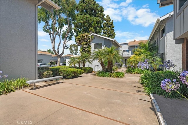 9554 Bickley Dr Unit 8, Huntington Beach, CA 92646 - surrounding community featuring a patio and a residential view