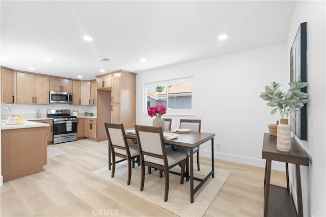 9554 Bickley Dr Unit 8, Huntington Beach, CA 92646 - dining space featuring light wood-style flooring and recessed lighting