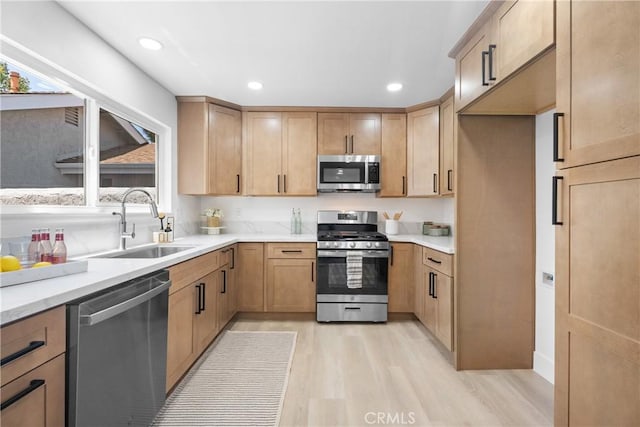 9554 Bickley Dr Unit 8, Huntington Beach, CA 92646 - kitchen featuring stainless steel appliances, light wood-style floors, and recessed lighting