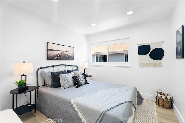 9554 Bickley Dr Unit 8, Huntington Beach, CA 92646 - bedroom with wood finished floors and recessed lighting