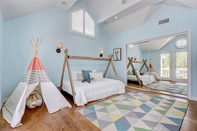 1310 Gates Ave, Manhattan Beach, CA 90266 - bedroom featuring vaulted ceiling, wood finished floors, access to exterior, and a closet