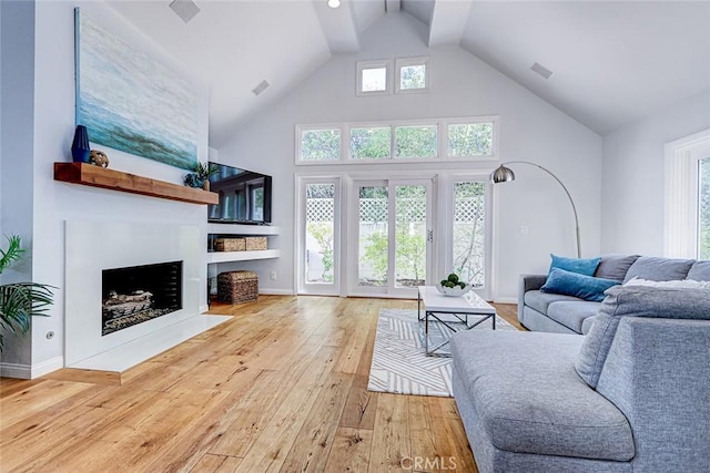 1310 Gates Ave, Manhattan Beach, CA 90266 - living room with hardwood / wood-style flooring, a fireplace, and high vaulted ceiling