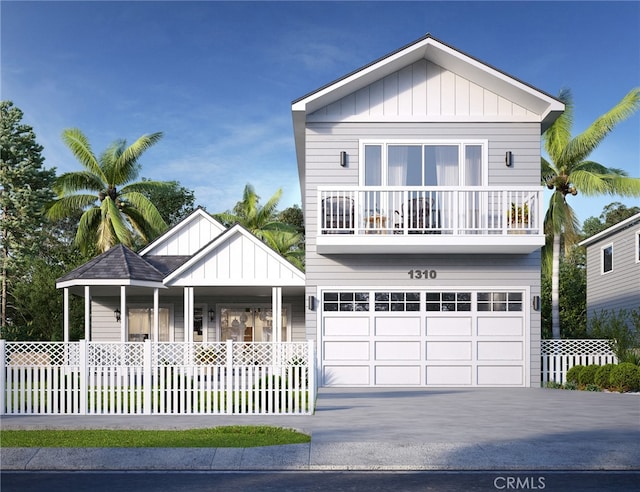 1310 Gates Ave, Manhattan Beach, CA 90266 - view of front of house featuring a balcony, covered porch, board and batten siding, concrete driveway, and an attached garage