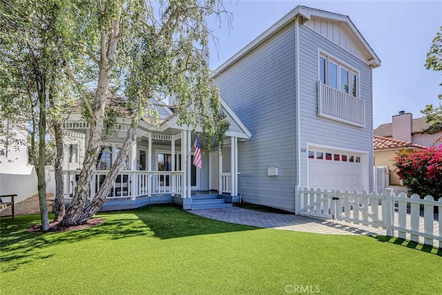1310 Gates Ave, Manhattan Beach, CA 90266 - view of front facade with a porch, a garage, driveway, and a gate