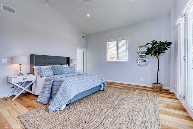 1310 Gates Ave, Manhattan Beach, CA 90266 - bedroom featuring wood finished floors, multiple windows, high vaulted ceiling, and a ceiling fan
