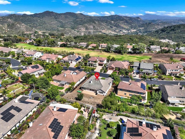 10576 Pinion Trl, Escondido, CA 92026 - aerial overview of property's location with a mountainous background and nearby suburban area