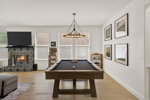 10576 Pinion Trl, Escondido, CA 92026 - playroom featuring light wood-style floors, billiards, and a tile fireplace
