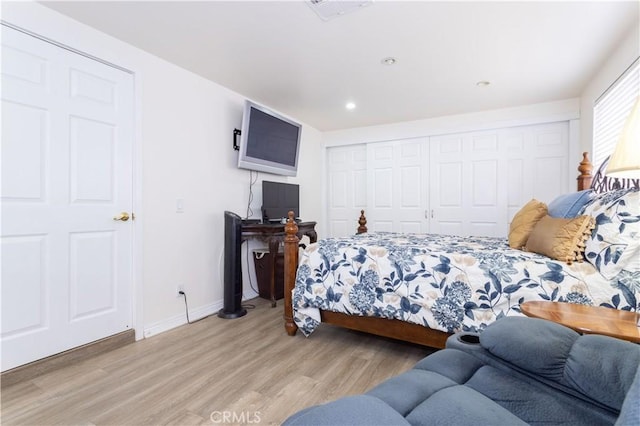 6843 Penfield Ave, Winnetka, CA 91306 - bedroom with wood finished floors, a closet, and recessed lighting