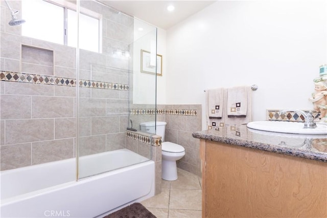 6843 Penfield Ave, Winnetka, CA 91306 - bathroom with vanity, tile patterned flooring, bathtub / shower combination, tile walls, and recessed lighting