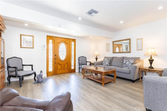 6843 Penfield Ave, Winnetka, CA 91306 - living room featuring light wood-style floors and recessed lighting