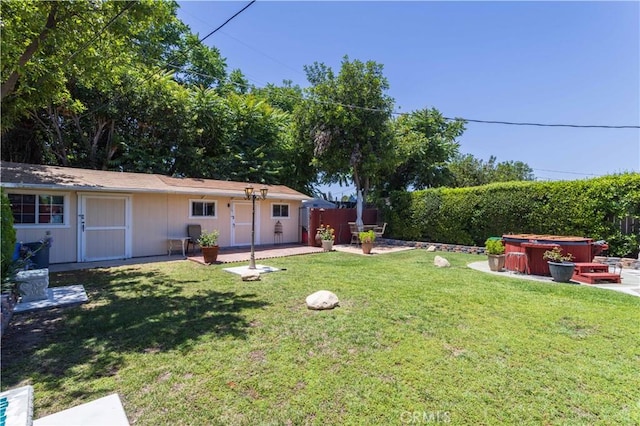 6843 Penfield Ave, Winnetka, CA 91306 - view of yard featuring a hot tub and a patio