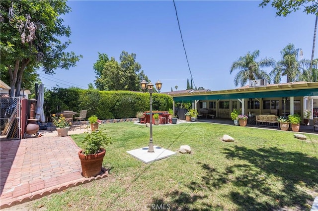 6843 Penfield Ave, Winnetka, CA 91306 - view of yard featuring a patio