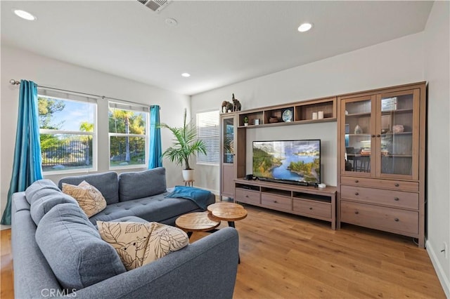 28238 Alton Way, Castaic, CA 91384 - living room featuring light wood-style floors and recessed lighting